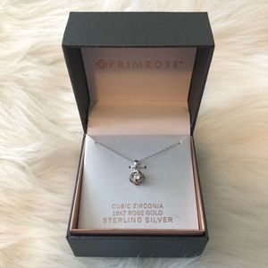 { primrose } • silver / rose gold necklace